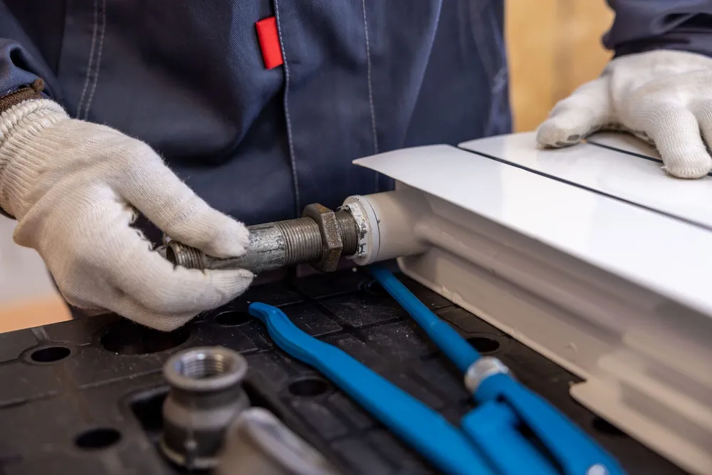 Well system piping being installed — illustrative stock photo of well service work, not an actual Pahrump job site